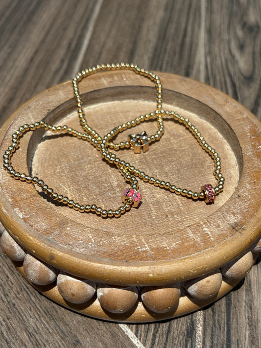 Gold with charm