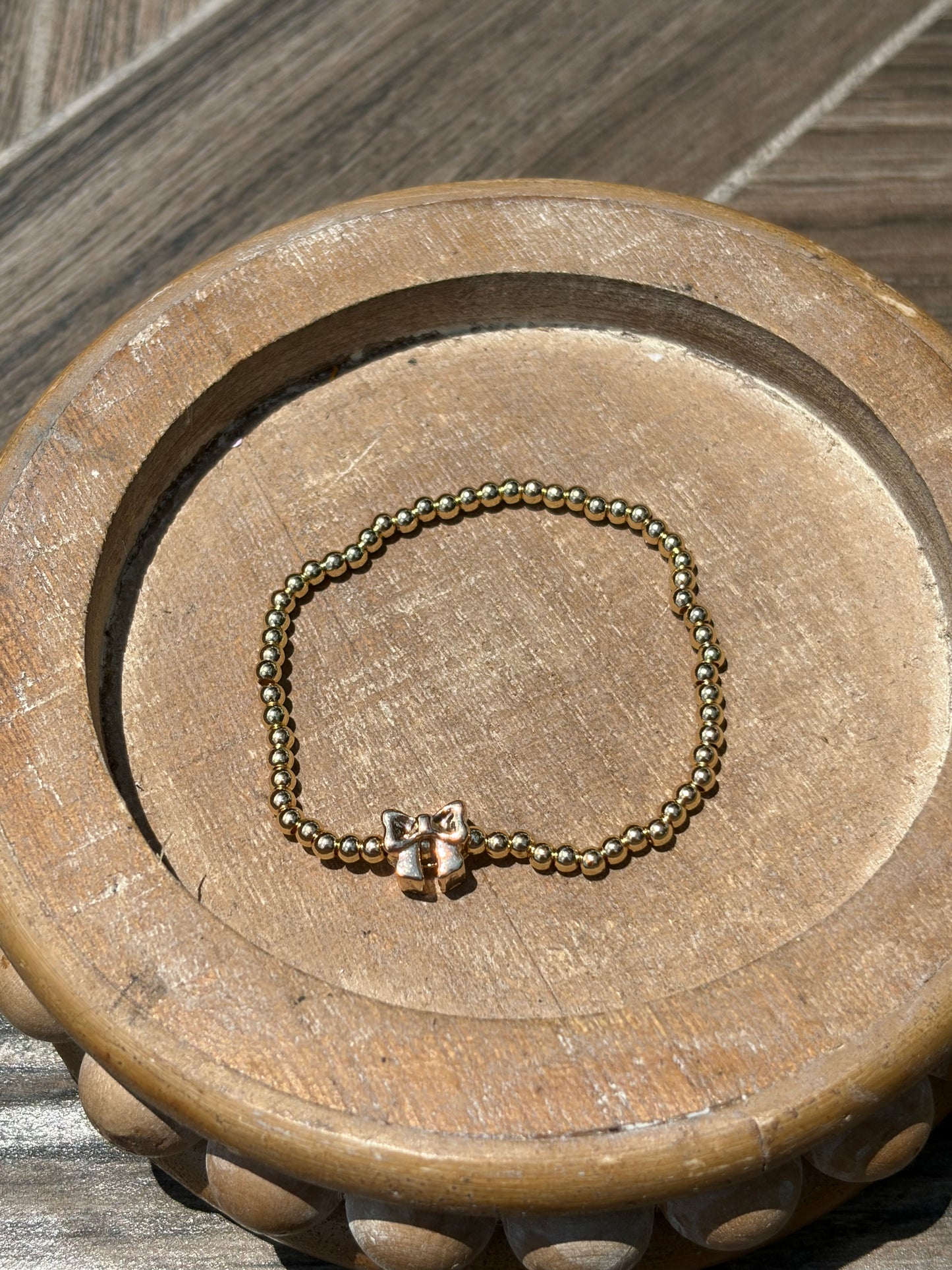 Gold with charm